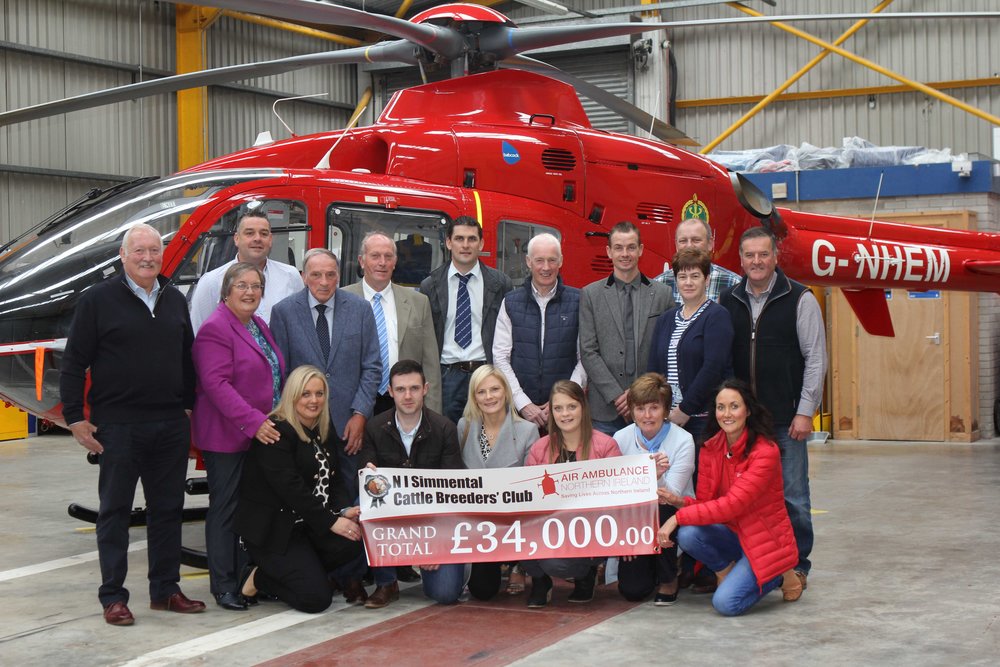 NI Simmental club presents cheque for £34,000 to AANI