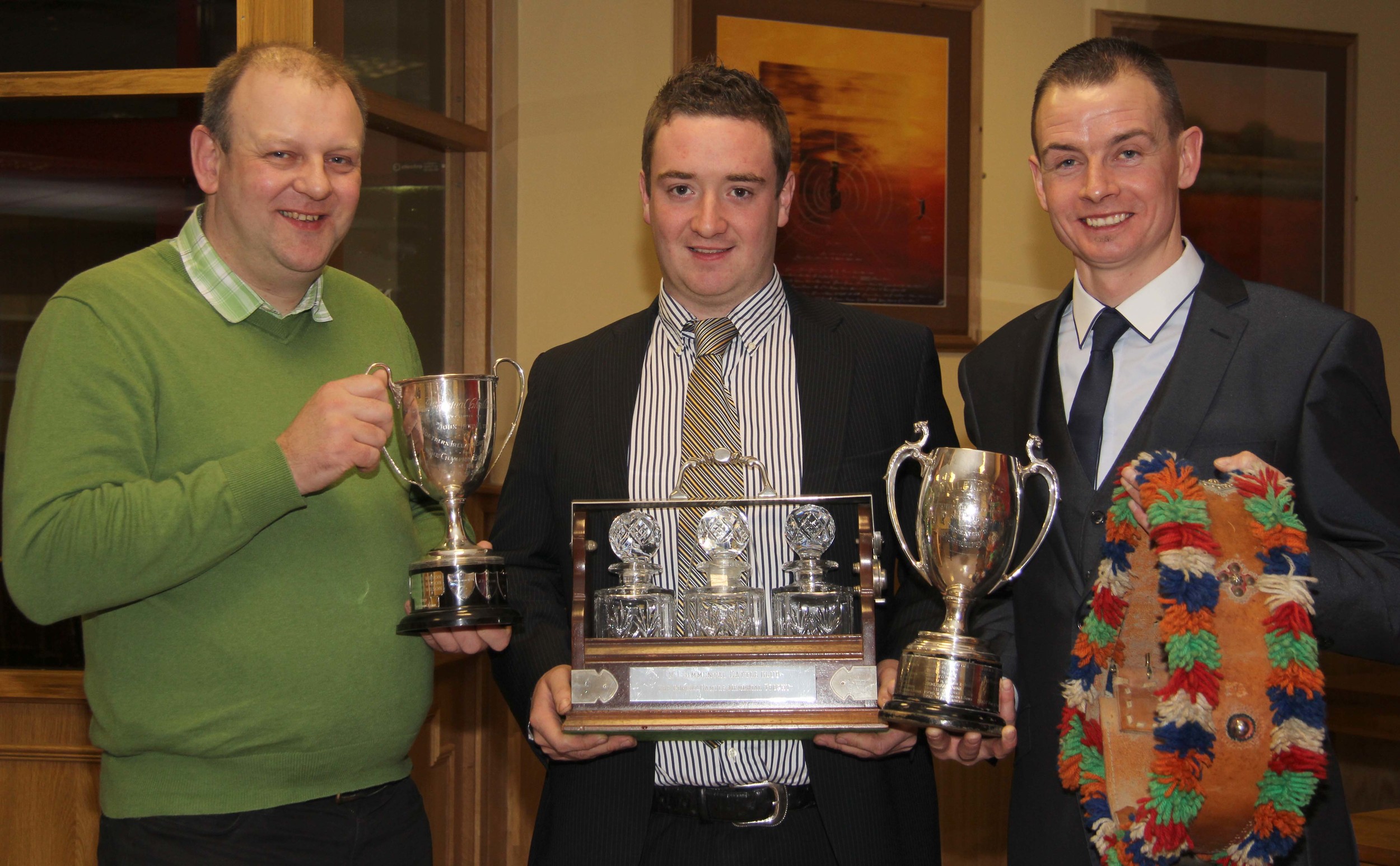 Marcus Berry, centre, receives an array of trophies on behalf of Noel and Mai Kilpatrick, Banbridge, at the NI Simmental Club's annual dinner. He was congratulated by vice-chairman Matthew Cunning, and chairman Richard Rodgers. 