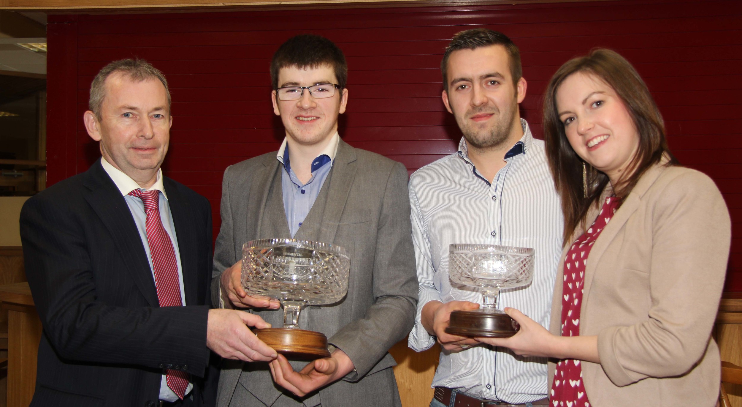 Andrew Tecey, Danske Bank, presents the male and reserve male of the year awards to Jamie and Christopher Boyd, and Adele McKeown, Slievenagh Herd, Portglenone. 
