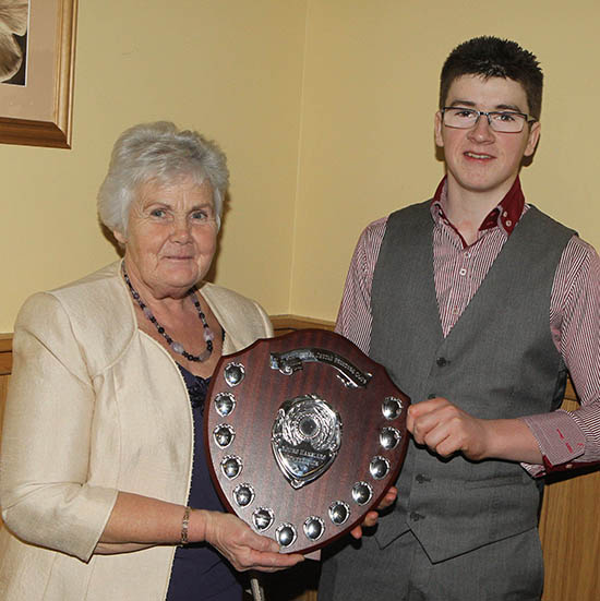 Thelma Gorman congratulates Jamie Boyd, Portglenone, winner of the Young Stockperson of the Year Award. 