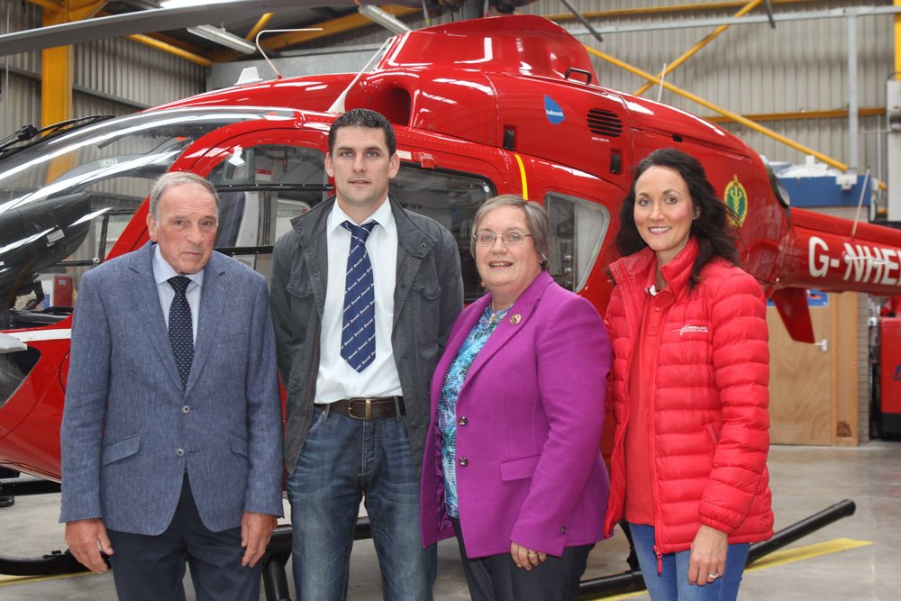 Kenneth and Avril Stubbs, Drumbulcan Herd, are pictured at Air Ambulance NI's operational base at the Maze, with Conrad Fegan, chairman, NI Simmental Club; and the charity's Kerry Anderson.