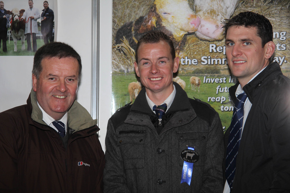 Pictured on the Simmental stand at the Pedigree Calf Fair @ Beef NI Expo are, from left: Robin Boyd, society vice presdient; Richard Rodgers, NI Club chairman; and committee member Conrad Fegan.