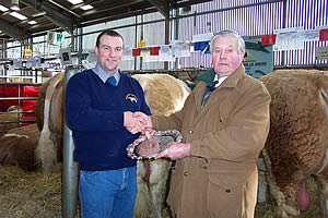 Bob Carter presenting Gerald with the R H Carter Perpetual Trophy for Drumsleed Pagan, Phoenix Pacific for best group of 3 